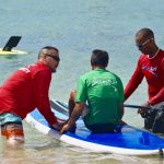 Lear how to Stand UP paddle while volunteering with travel2change