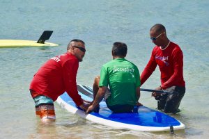 Lear how to Stand UP paddle while volunteering with travel2change