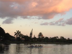 Enjoy the sunset while paddling an Outrigger Canoe