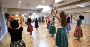 women dancing in traditional skirts